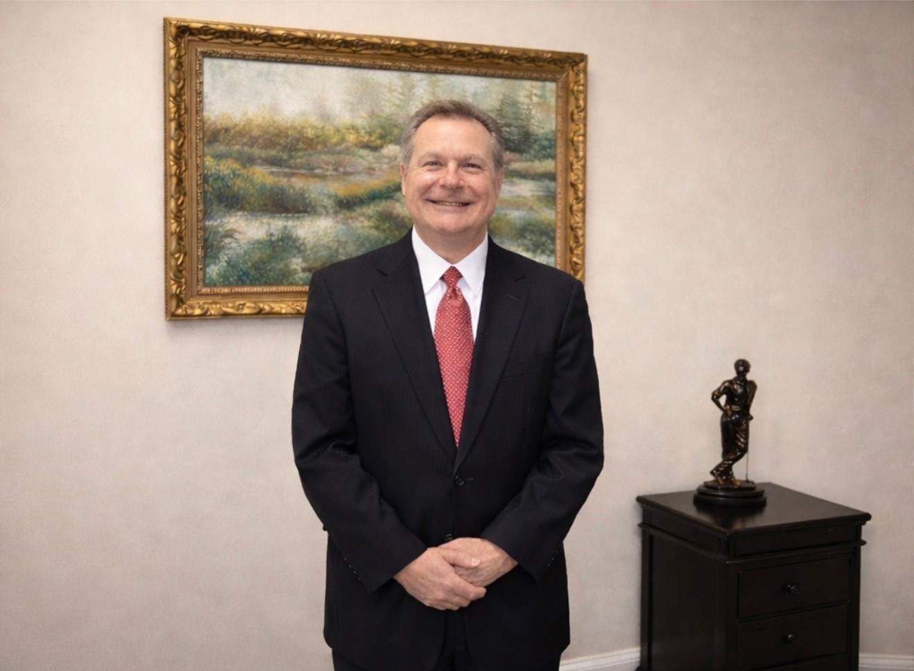 Photo of Thomas N. Torzewski, Esq. in an office